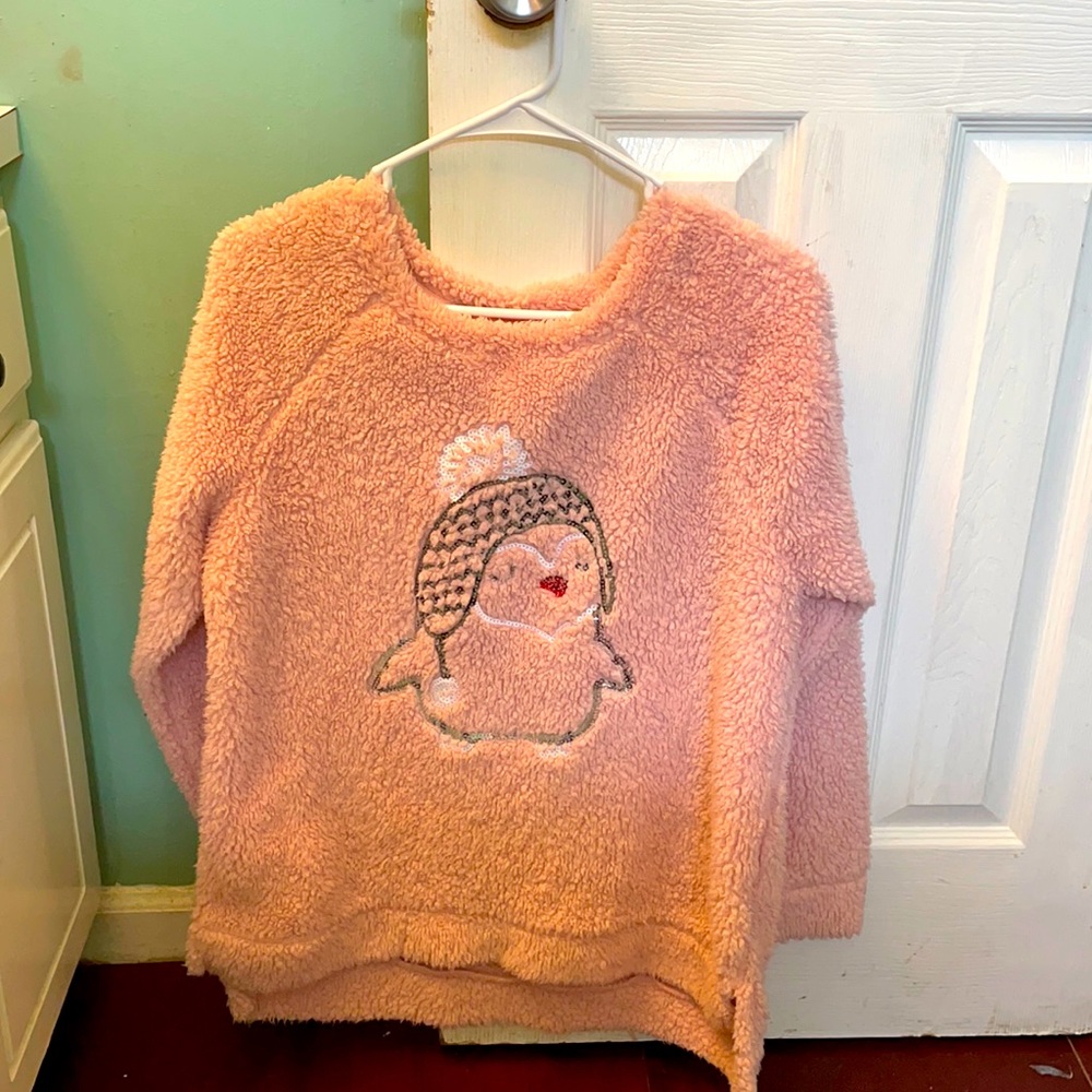 Pink Long-sleeve fuzzy pullover w/ a penguin.